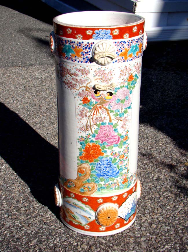 A late 19th century Japanese polycrome porcelain umbrella stand